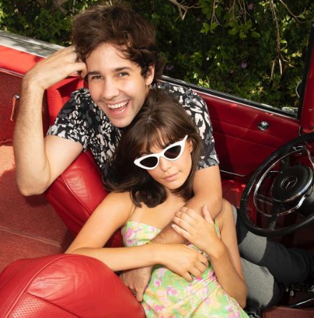 David Dobrik and Charlotte D'Alessio posed for a picture as they sat in a car.